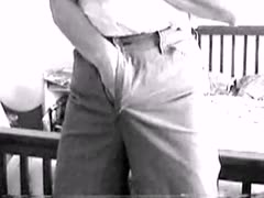 Real-life hidden camera footage shows a mischievous wife masturbating by removing her trousers.